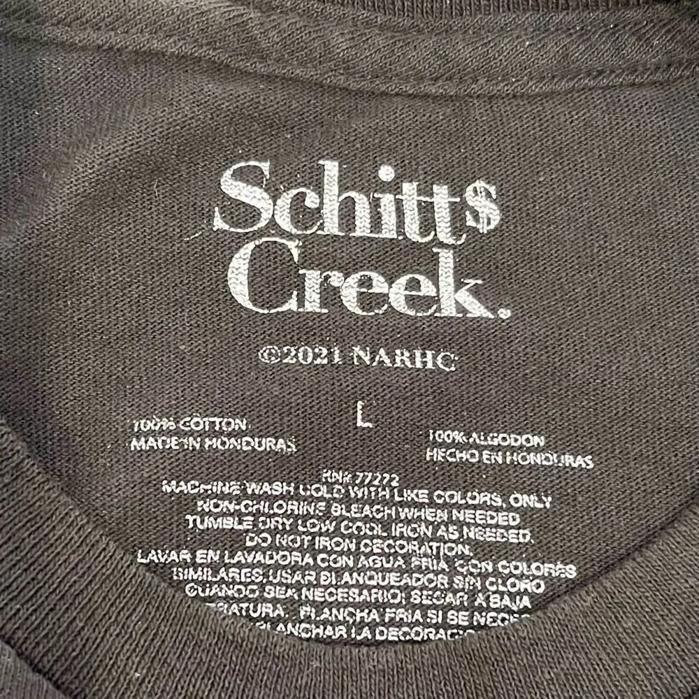 Schitt’s Creek Rose Apothecary T-Shirt. New without tags. Size large. Black.